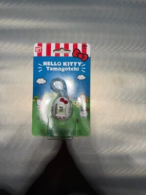 Hello Kitty Tamagotchi Packaging — Blue & White